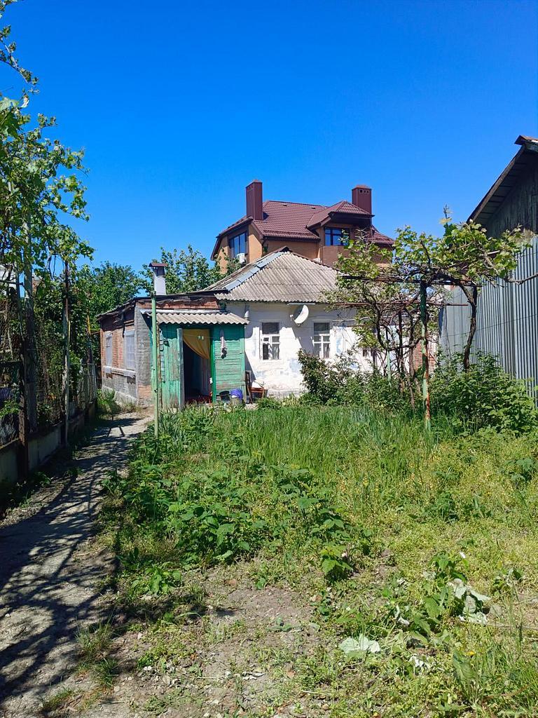 трехкомнатный домрайон  Фото 1