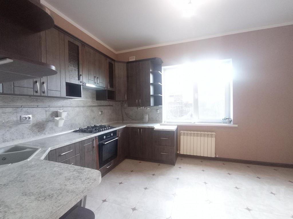 трехкомнатный домрайон  Фото 3